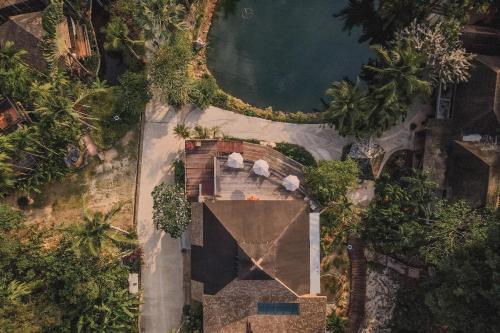 an overhead view of a house with trees at The Spa Koh Chang Resort in Ko Chang