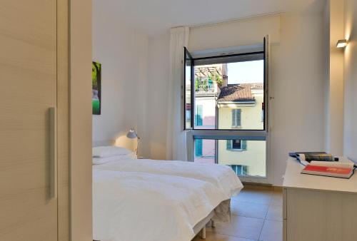 A bed or beds in a room at UR-NEST Galleria del Toro