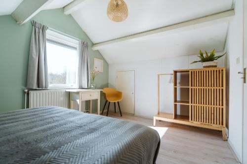 Katil atau katil-katil dalam bilik di Poldersbos 3 - Ouddorp "BarLeDunes" - met jacuzzi en sauna