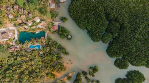 an aerial view of a river and trees at The Spa Koh Chang Resort in Ko Chang