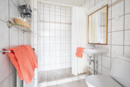 Koupelna v ubytování Hotel Dania
