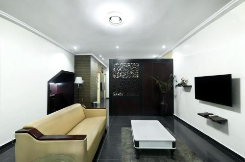 Μια τηλεόραση ή/και κέντρο ψυχαγωγίας στο Anabel Apartment and Suites, Abuja