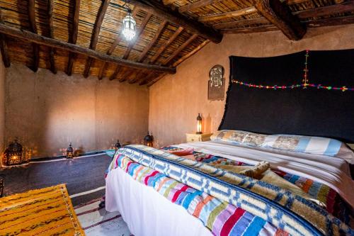 Katil atau katil-katil dalam bilik di Berber Camp & Desert Tours