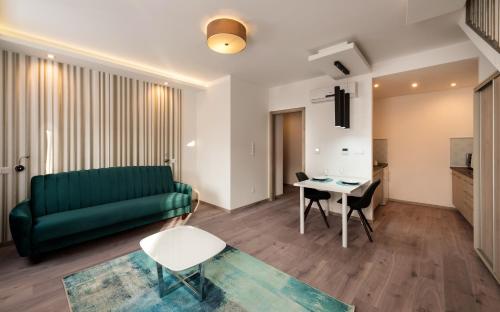 Coin salon dans l'établissement Fibula Residence Hotel & Wellness - Adults Only