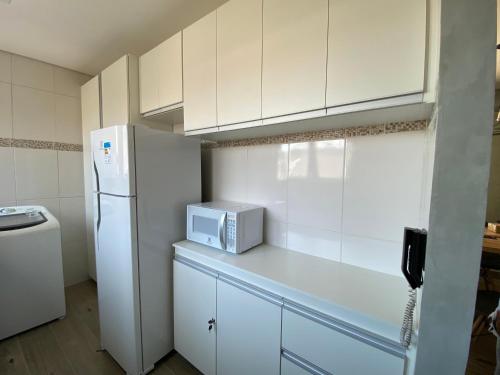 Dapur atau dapur kecil di Cond/ Resid/ Cavallari/4Min da Unimar