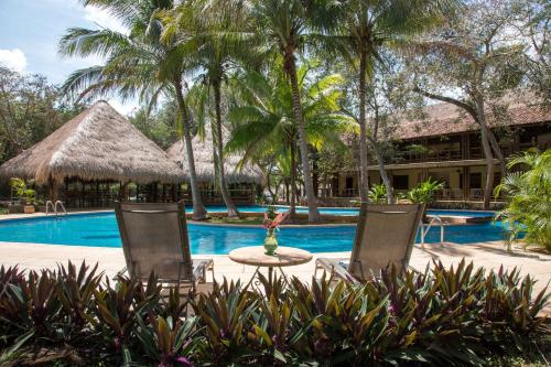 La alberca dentro o cerca de The Lodge At Uxmal