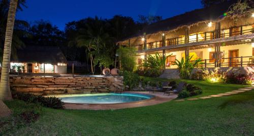 La alberca dentro o cerca de The Lodge At Uxmal