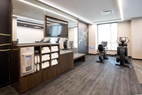 an office with a hair salon with a hair dryer at Hotel Indigo - Columbus at Riverfront Place by IHG in Columbus
