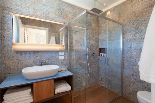 a bathroom with a sink and a shower at Villa Francesca Relais in Gradara