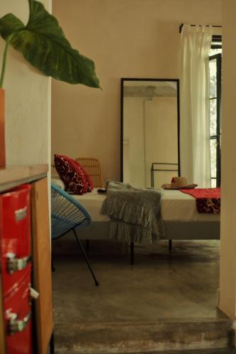 Una cama o camas en una habitación de FIXIE LOFTS - Colonial Villa Suites with Pool