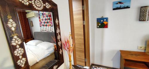 Ένα ή περισσότερα κρεβάτια σε δωμάτιο στο Marmara Guesthouse