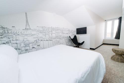Un pat sau paturi într-o cameră la Atypik Hotel