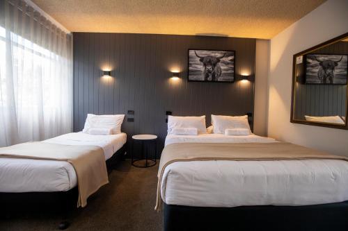 Кровать или кровати в номере City Centre Motel Armidale