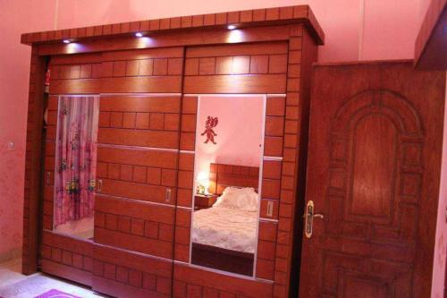Кровать или кровати в номере Maged Pyramids View Inn
