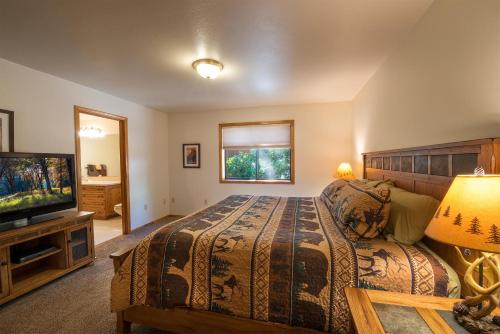 Quail Crossing Lodge tesisinde bir odada yatak veya yataklar
