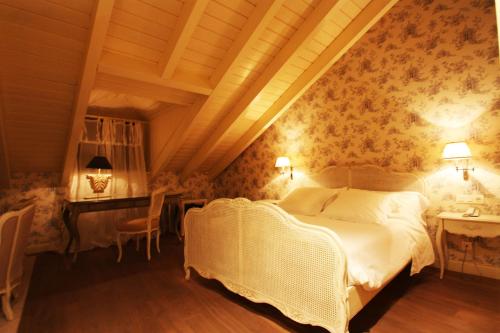 Säng eller sängar i ett rum på Las Doñas del Portazgo