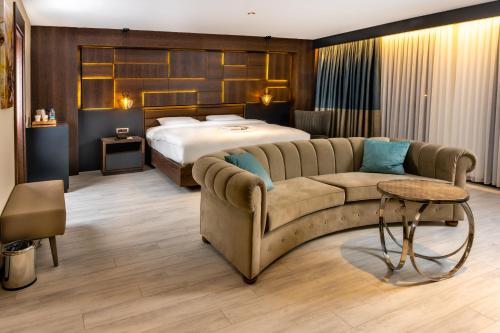 Postel nebo postele na pokoji v ubytování Anemon Kent Aydın Otel
