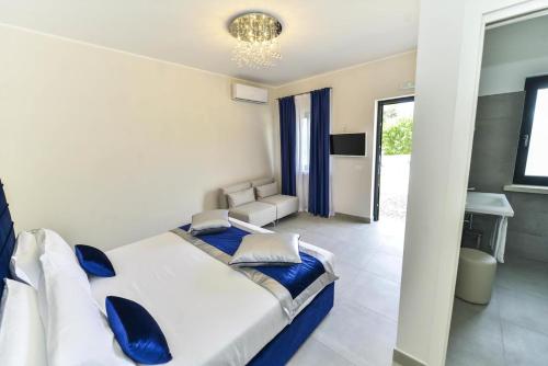Postel nebo postele na pokoji v ubytování Agriturismo Borgo Imperiale