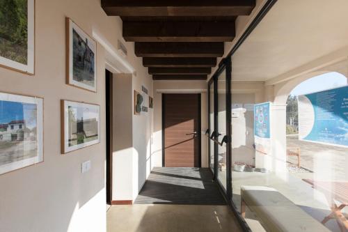 a hallway of a house with a glass door at Casa Di Anna - Fattoria Sociale in Mestre