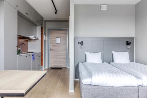 מיטה או מיטות בחדר ב-Part-Time Home Täby