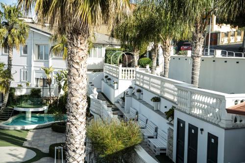 arial view of a balcony with palm trees at Leon D'Oro in Corleone