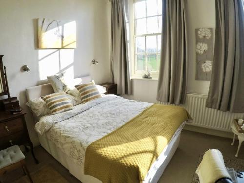 Postel nebo postele na pokoji v ubytování Whitchurch Farm Guesthouse