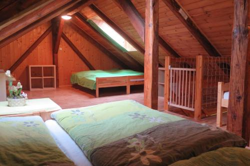 Postel nebo postele na pokoji v ubytování Apartments Skiareál U Vodárny Bedřichov