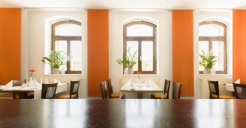 Restaurace v ubytování Hotel Am Tiefwarensee