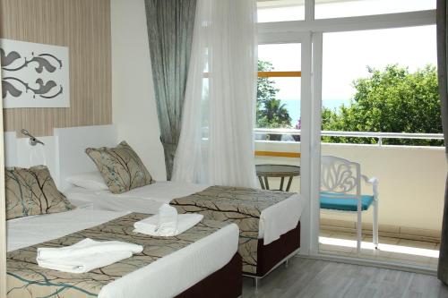 Ein Bett oder Betten in einem Zimmer der Unterkunft Side Miami Beach Hotel
