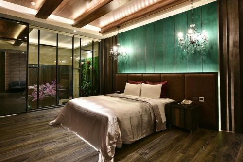 Ένα ή περισσότερα κρεβάτια σε δωμάτιο στο Venice Motel