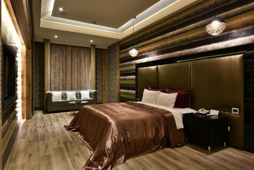 Ένα ή περισσότερα κρεβάτια σε δωμάτιο στο Venice Motel