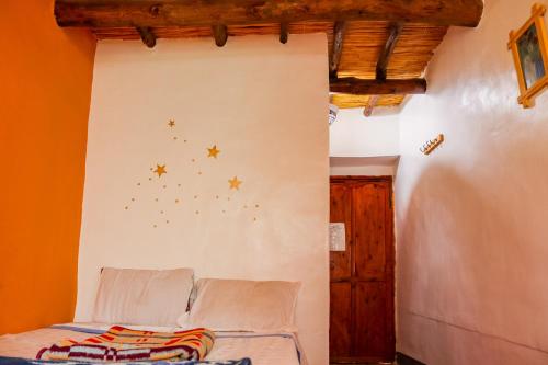 Postel nebo postele na pokoji v ubytování Auberge Tigmmi N'Tamazirte