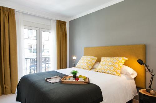 Ένα ή περισσότερα κρεβάτια σε δωμάτιο στο Arizona Apartment