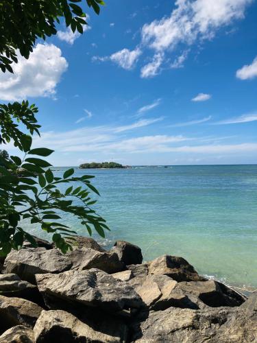 a view of the ocean from the beach at The Mango Leaf in Matara