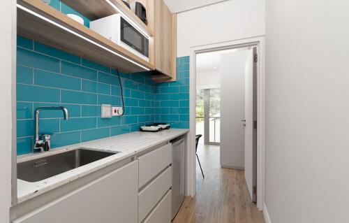Kuchyň nebo kuchyňský kout v ubytování Sables d'Or Luxury Apartments