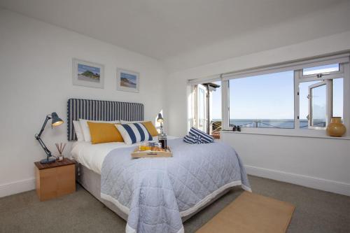 Säng eller sängar i ett rum på Shimoda, Sidmouth
