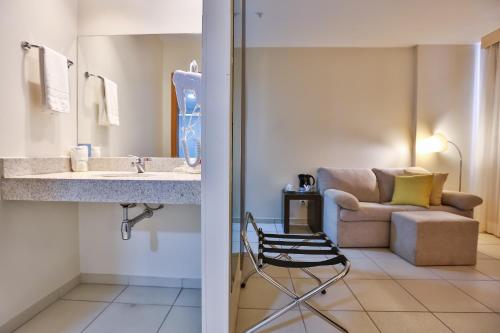Ванная комната в Comfort Hotel Goiânia