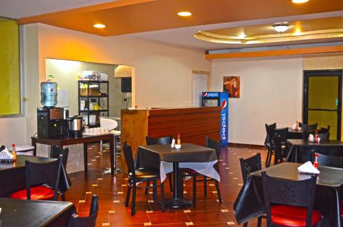 En restaurang eller annat matställe på Hotel Plaza Palmero