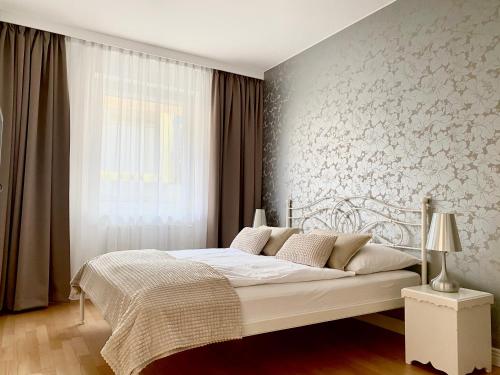 Posteľ alebo postele v izbe v ubytovaní Apartamenty Maritimo