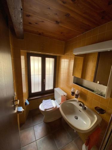 Koupelna v ubytování Osteria Vittoria