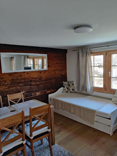 Postel nebo postele na pokoji v ubytování Little Chalet Pirelli 1783