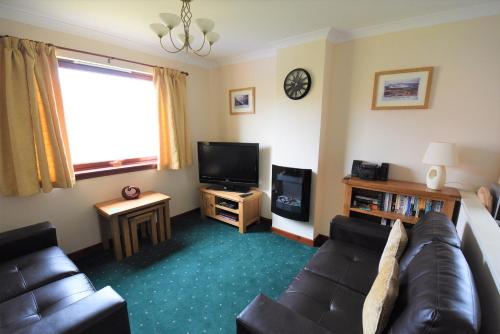 A seating area at Balcarres Self Catering 