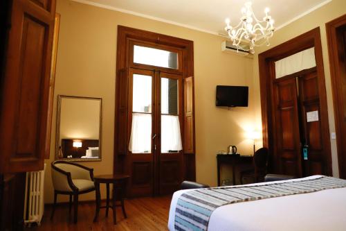 Postel nebo postele na pokoji v ubytování Howard Johnson Resort & Spa Escobar