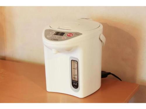 a white toaster sitting on top of a table at Fuji Green Hotel - Vacation STAY 18923v in Fuji