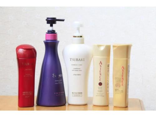 a group of four products sitting on a shelf at Fuji Green Hotel - Vacation STAY 18923v in Fuji
