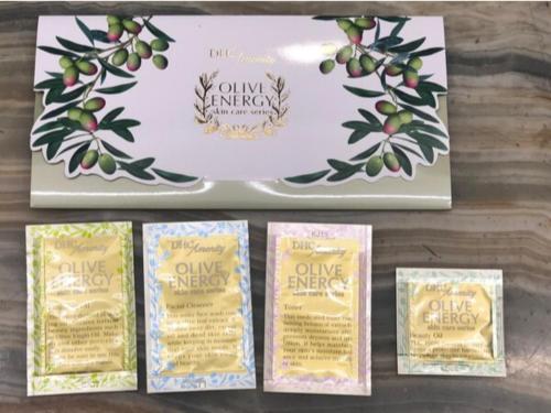 three boxes of olive energy products on a table at Fuji Green Hotel - Vacation STAY 18923v in Fuji