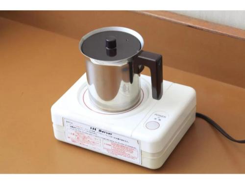 a white blender sitting on top of a counter at Fuji Green Hotel - Vacation STAY 18930v in Fuji