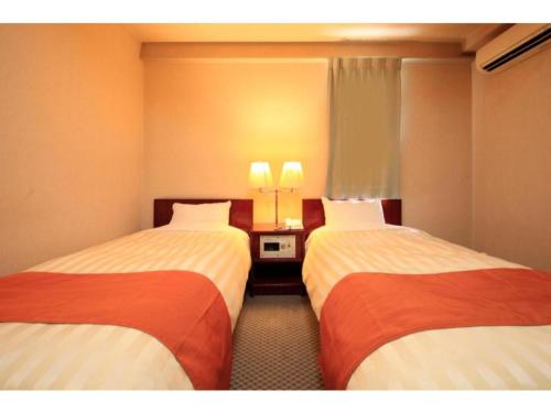 Giường trong phòng chung tại Fujinomiya Green Hotel - Vacation STAY 19029v