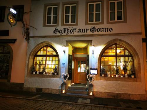 a building with two hearts on the front of it at Hotel Sonne - Das kleine Altstadt Hotel in Rothenburg ob der Tauber