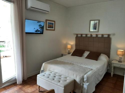 Postel nebo postele na pokoji v ubytování Studio Masol avec terrasse